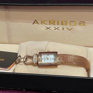 Rose gold adjust bracelet style watch w/crystals